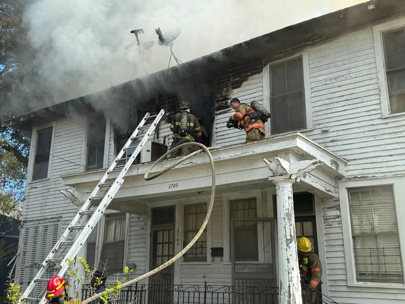 Firefighters: Burning house full of propane tanks