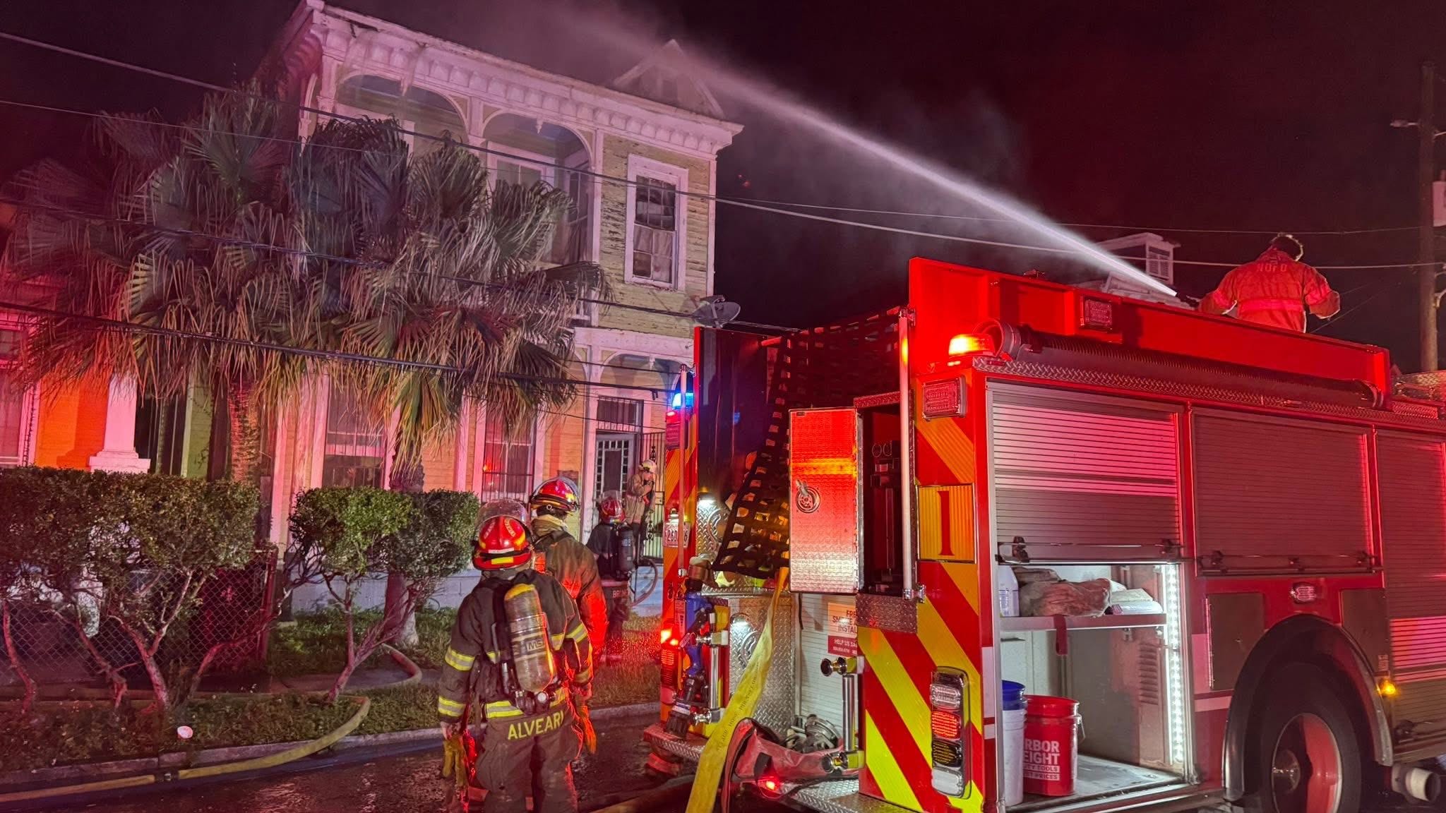 Fire crews battle blaze on Baronne, two people seen running from building