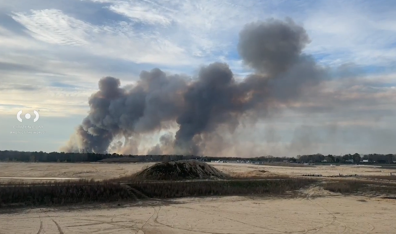 A wildfire burns in the Greenwood Forest Wildlife Area on Tuesday