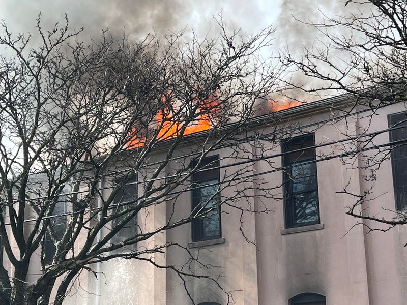 Flames coming from a 4-alarm fire at an East Williamsburg church on the afternoon of Easter Sunday.