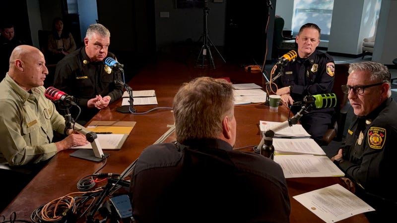 Fire chiefs look on as LAFD Chief Jaime Moore talks about Palisades Fire.