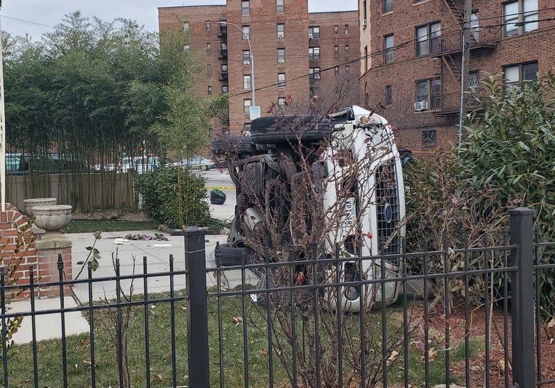 The SUV flipped on its side in front of the victim's house in Flushing on Dec. 27, 2022