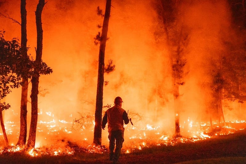 A firefighter battling a fire in Medford, New Jersey back in 2023.