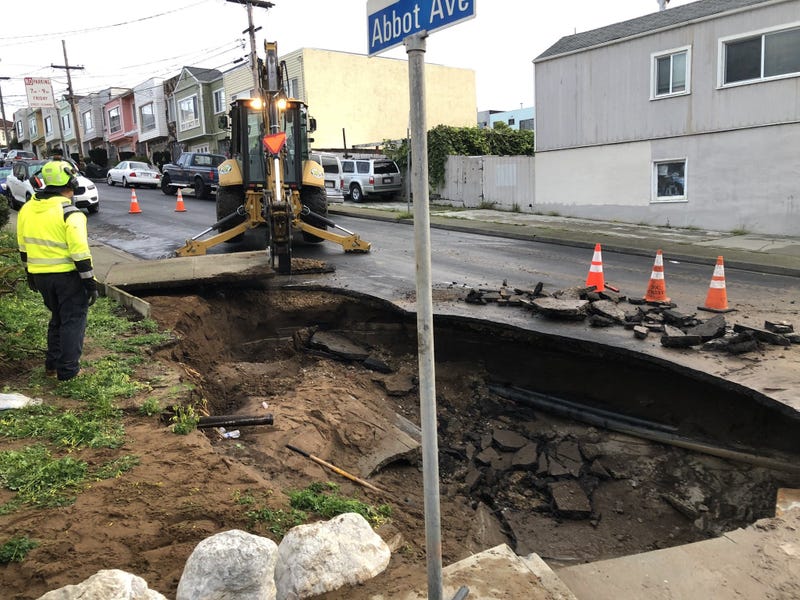 A giant sinkhole has opened up in the middle of a residential area south of San Francisco — the second sinkhole the Bay Area has seen in the past week.