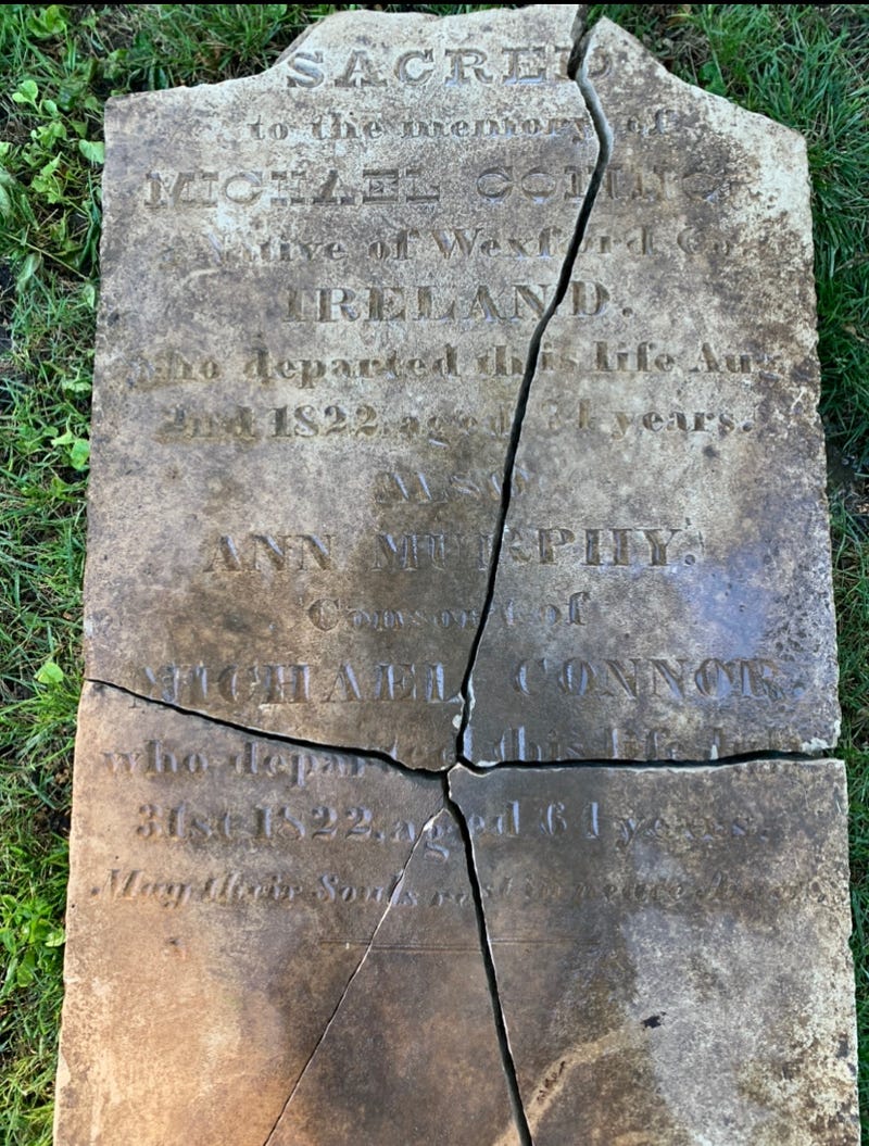 Historic tombstone that was being used as paving block.