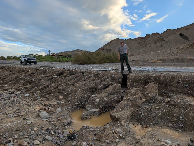 Superintendent Mike Reynolds reviews damage on the north end of Badwater Road in Death Valley