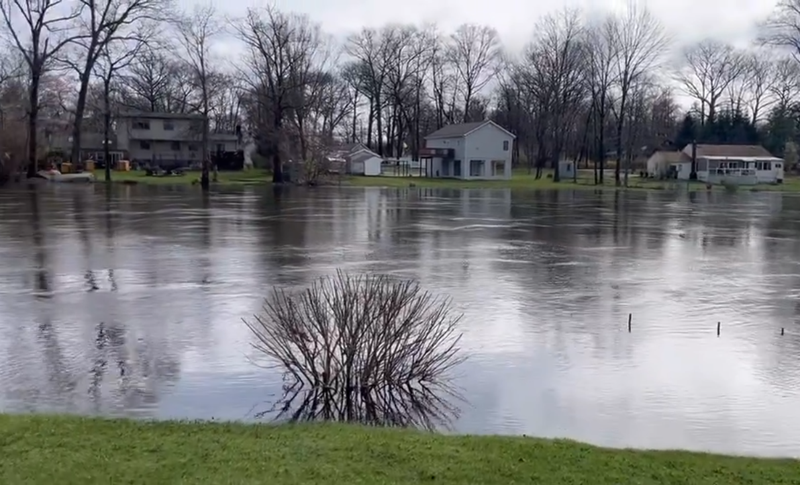 The Passaic River was closing in on homes in Little Falls, New Jersey, on Thursday