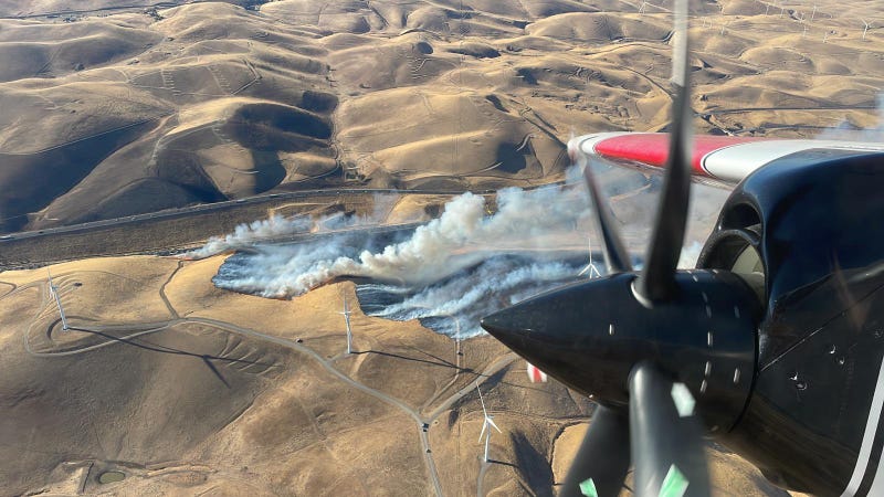 An aerial shot as the Flynn Fire burns at the intersection of North Flynn Road and California Interstate 580.