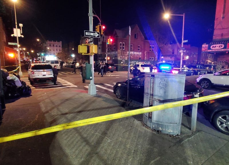 Police investigate at the shooting scene in the Tremont section early Tuesday morning