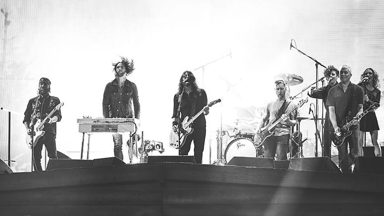 Foo Fighters take a hilarious look at old images for 25th anniversary