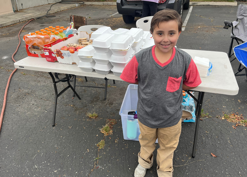 Event where KNX Hero Brady Ahumada gave away meals to the homeless in LA
