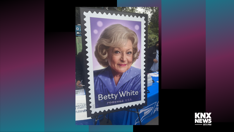 Betty White's forever stamp features her wearing pawprint earrings, symbolizing her love for animals. 