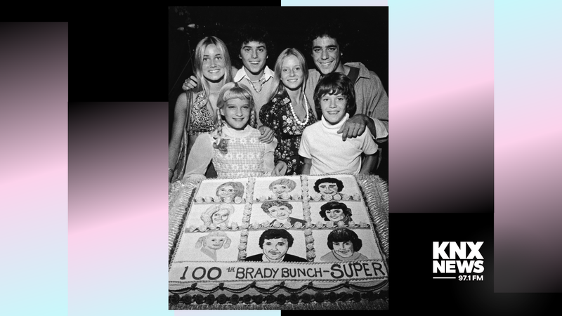 Young cast members of the television series, 'The Brady Bunch' pose with a cake celebrating the show's 100th episode, circa 1973. (L-R): Maureen McCormick, Susan Olsen, Christopher Knight, Eve Plumb, Barry Williams and Mike Lookinland. 