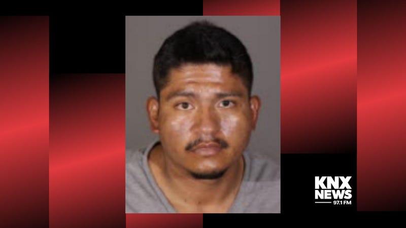 mugshot of latino man with mustache and goatee