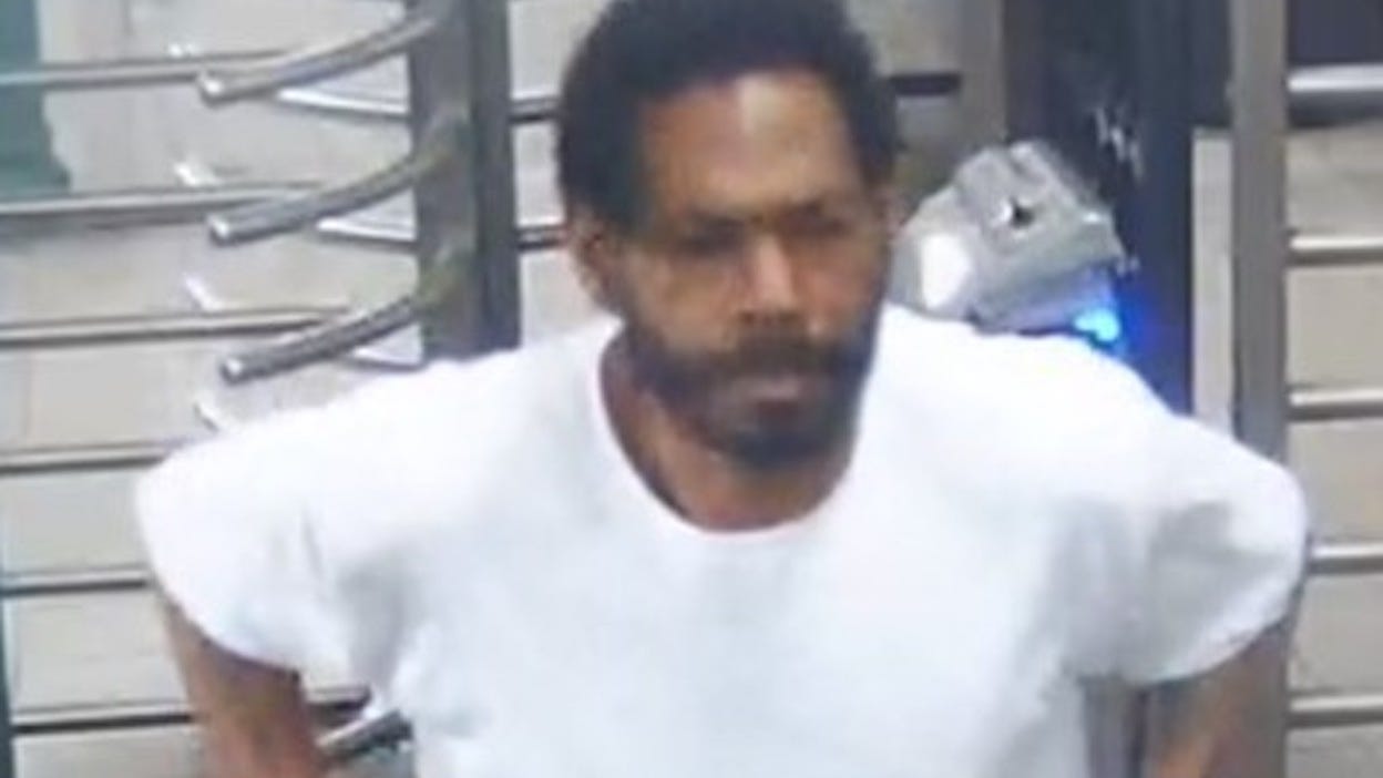 Man reaching under women's skirts at Manhattan subway stations