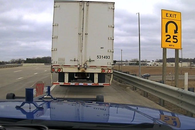 A state trooper made a shocking discovery on Tuesday after they conducted a traffic stop on a semi truck driver, only to find out the man behind the wheel was wanted for murder in another state.