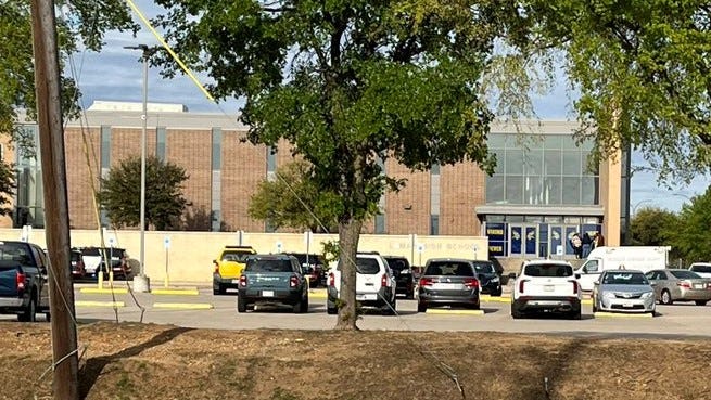 A student was fatally shot outside Lamar High School in Arlington, Texas on Monday, March 20, 2023.