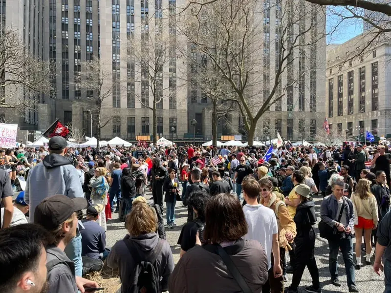 Hundreds gather at Collect Pond Park near the courthouse ahead of former President Donald Trump's arraignment hearing on April 04, 2023, in New York City. 