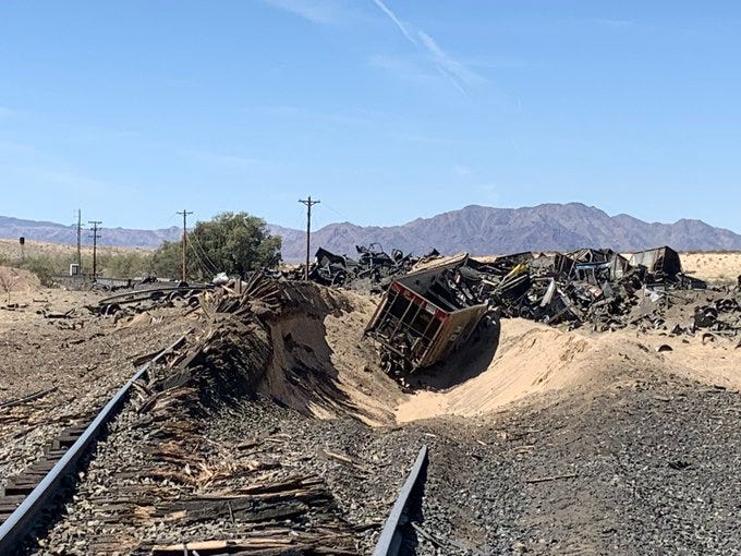 Crews responded to a multi-car train derailment in the desert of the Mojave National Preserve on Monday. 