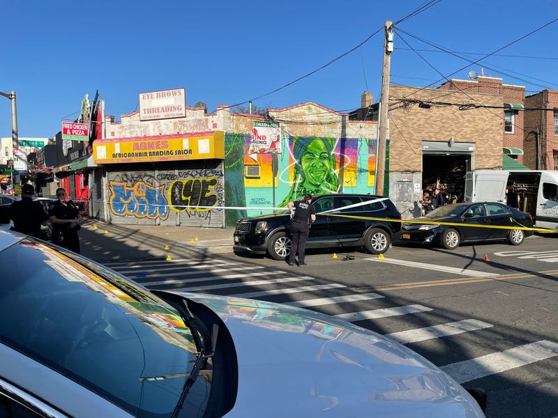 At least a dozen evidence markers lined the ground outside the restaurant on Thursday morning