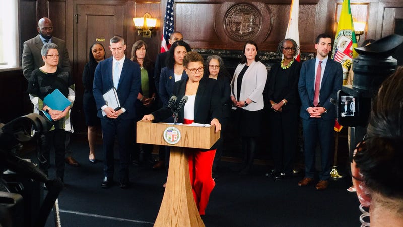 karen bass at podium at city hall