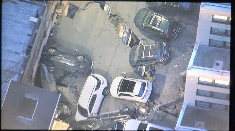It's not yet know what caused the parking garage to give way