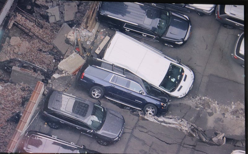 One worker was killed as the concrete levels of the garage pancaked around 4 p.m. Tuesday