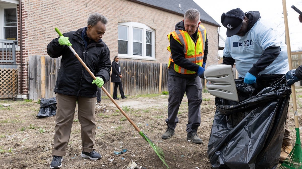 Lightfoot picks up a rake, joins Earth Day cleanup effort in Englewood