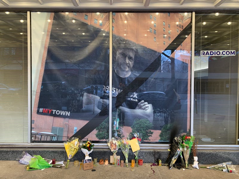 Flowers and candles left for Michael outside of the WNCX studios after his passing