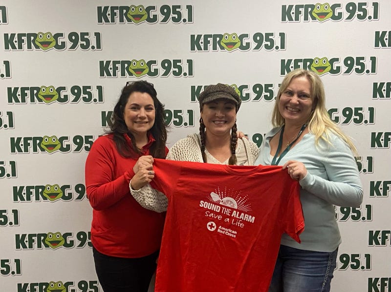 Christine Welch and Yevette Basinger of the Red Cross with K-Frog's Pepper