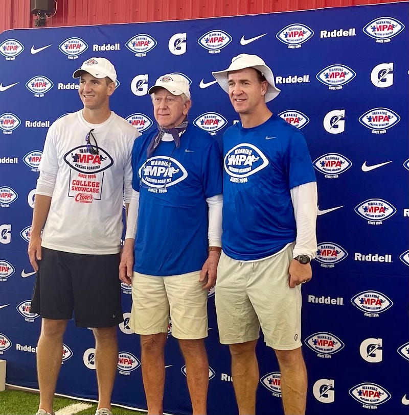 Eli Manning, Archie Manning, and Peyton Manning at the Manning Passing Academy