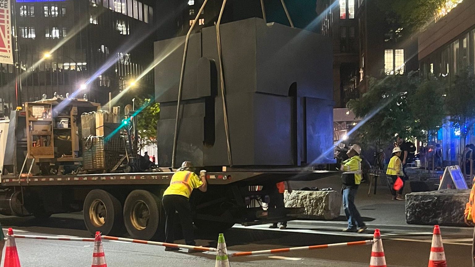 OUT FOR A SPIN: Legendary 'Cube' of Astor Place taken away on truck, but it will be back