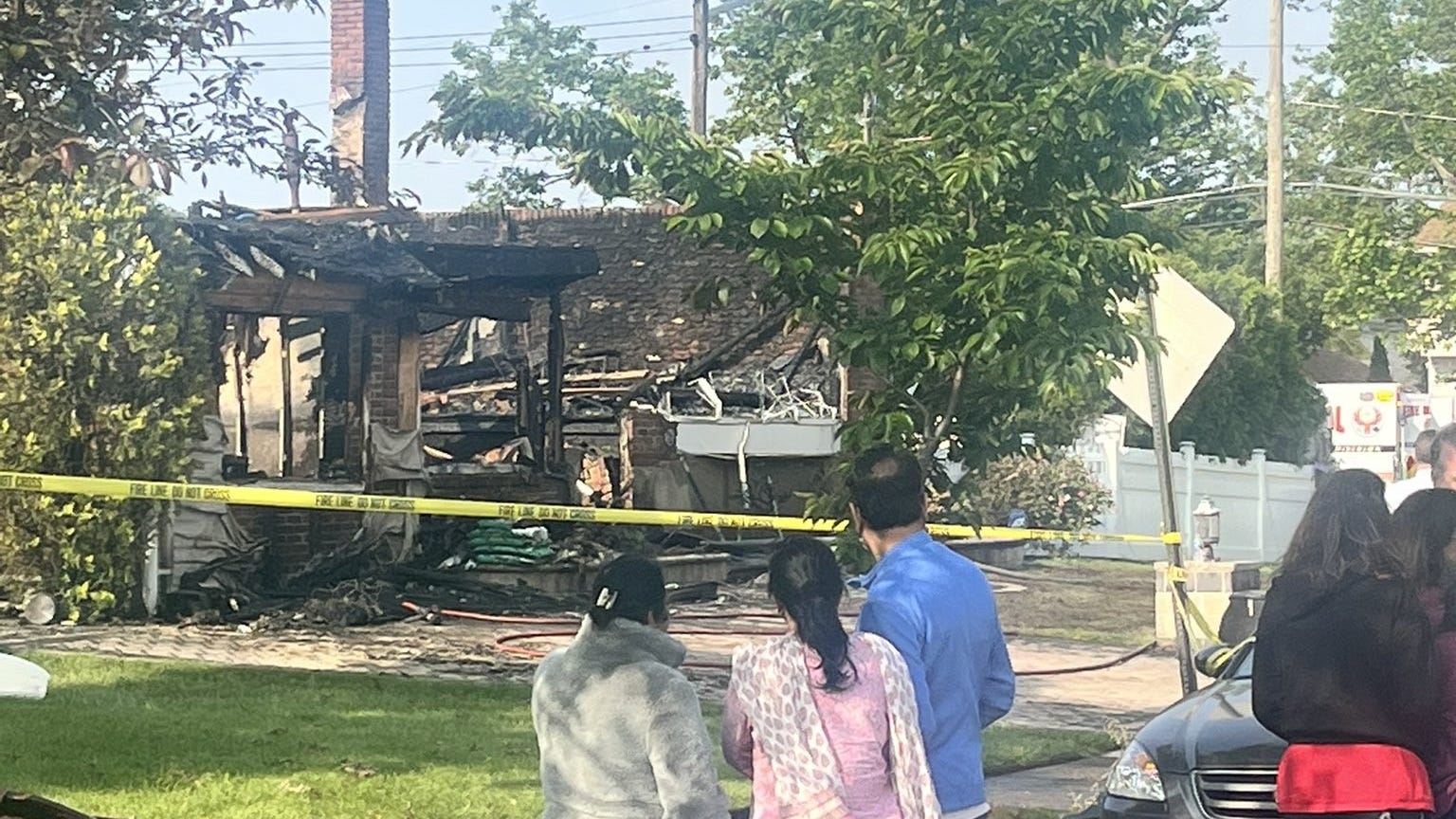 Long Island fire: Woman dies trying to save dog, 7 relatives escape