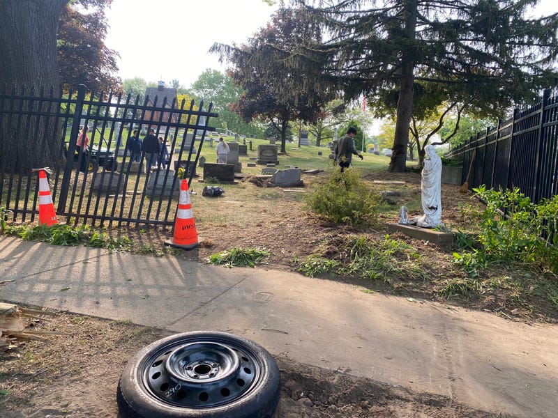Two carjackings in Garden City spurred on a police pursuit into Dearborn Friday morning, but the chase ended for one driver who lost control and crashed through a cemetery.