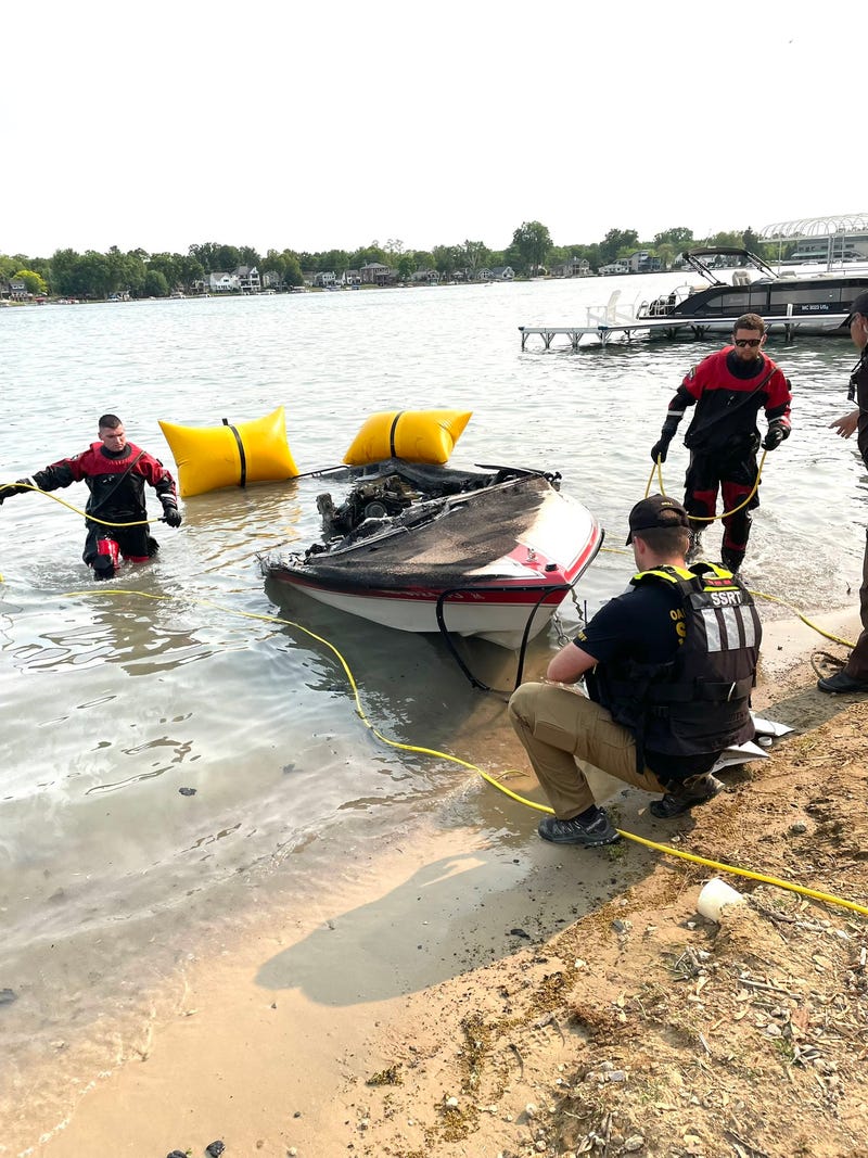 Men recovering boat