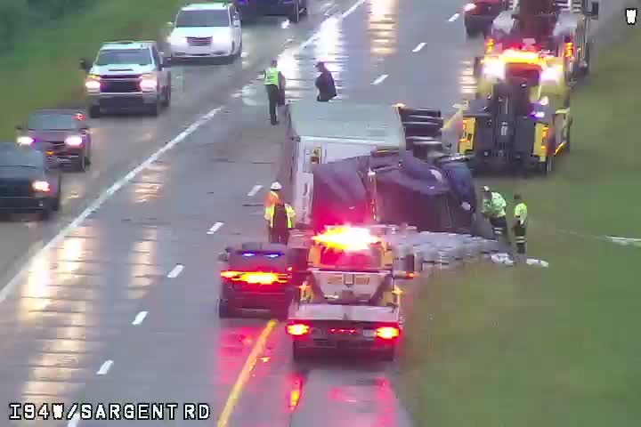 Beer kegs went flying off an overturned semi on I-94 in Jackson County on Tuesday morning causing traffic tie ups for drivers on their morning commute as troopers shut down parts of the freeway to clear the road of booze.