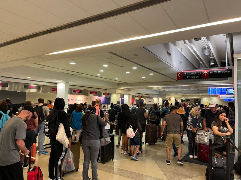 Long lines of frustrated travelers at Philadelphia International Airport on June 28, 2023.