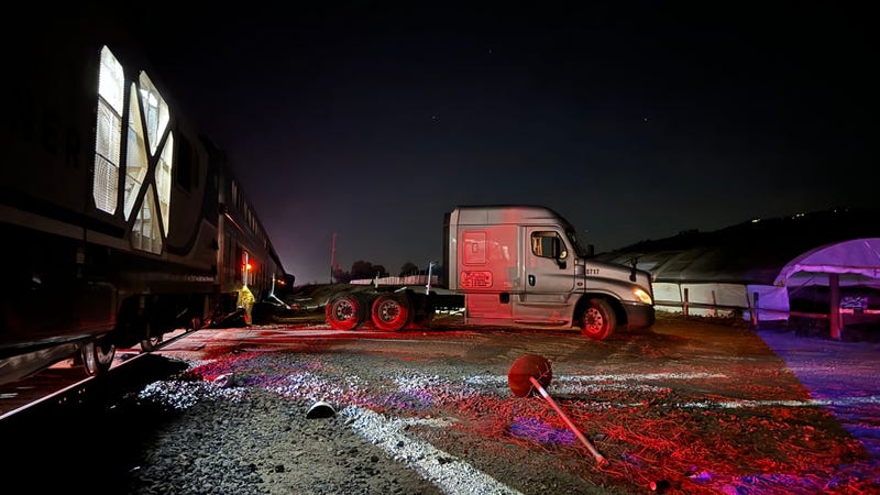 An Amtrak train slammed into a truck at crossing in Ventura County, injuring five people and prompting closures.