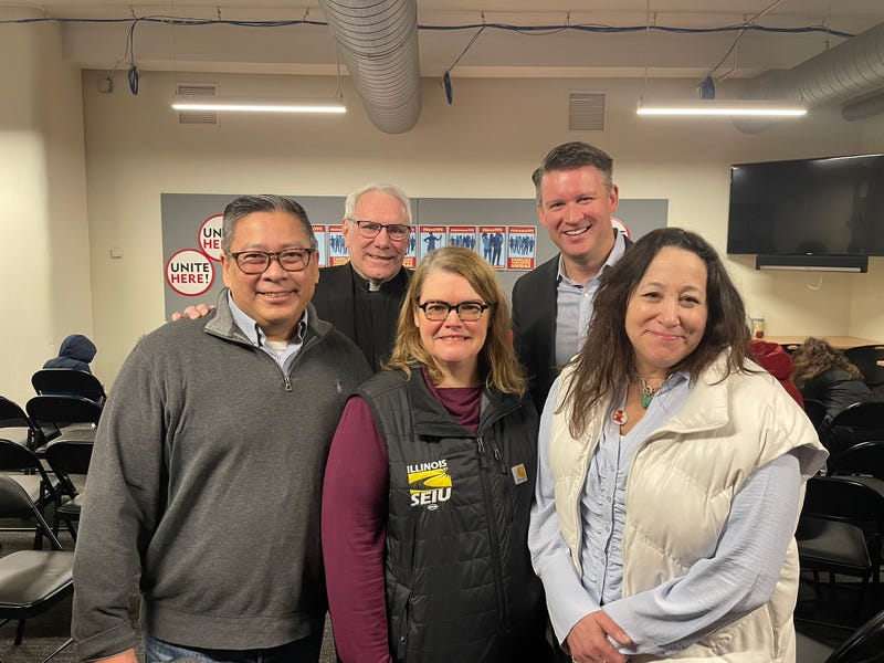 Ald. Bill Conway (second row, right),  was among those at a free legal aid clinic for migrants on Saturday.