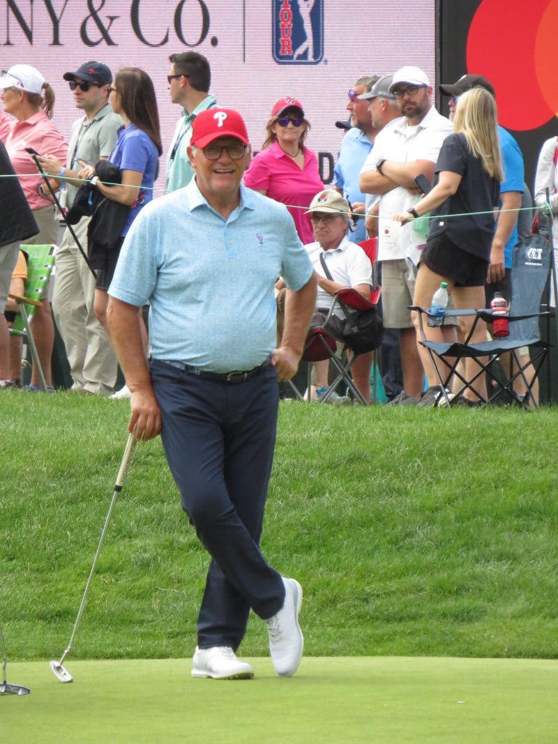11-time national champion UConn women's basketball coach Geno Auriemma, moments before sinking a long putt on the 9th hole at the Travelers Pro-Am, 6/21/23 at Cromwell