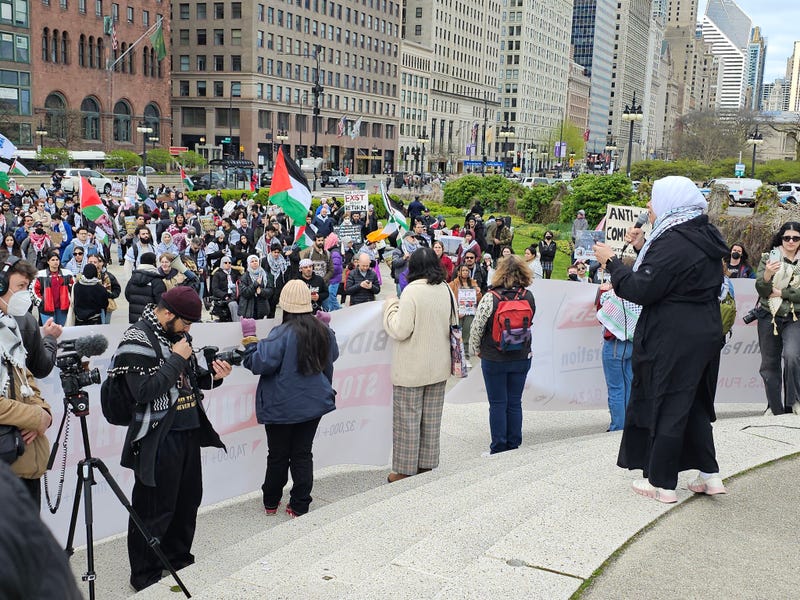 A speaker address a crowd of hundreds at a pro-Palestinian rally in downtown Chicago on Saturday.