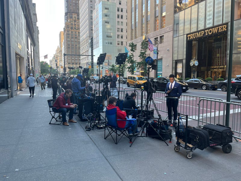 Members of the media begin to set up around 7:15 a.m. Friday across from Trump Tower on Fifth Avenue