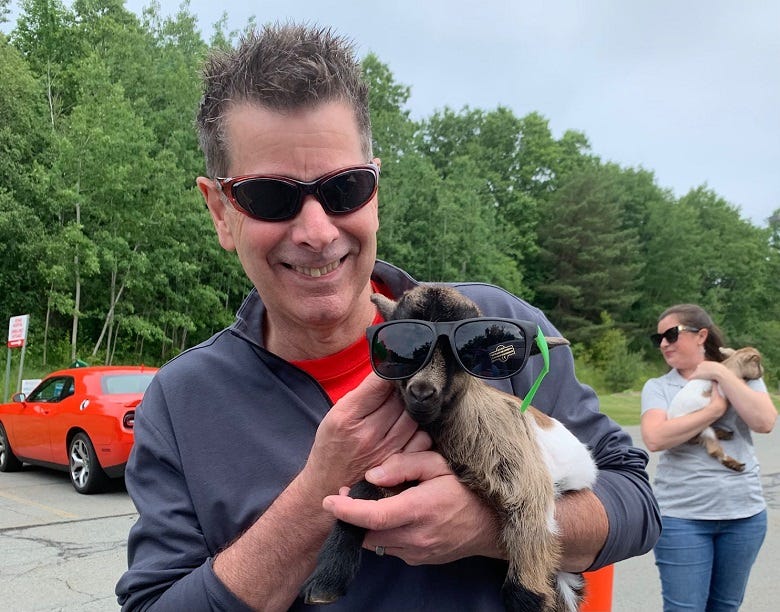 Rocky with a baby goat