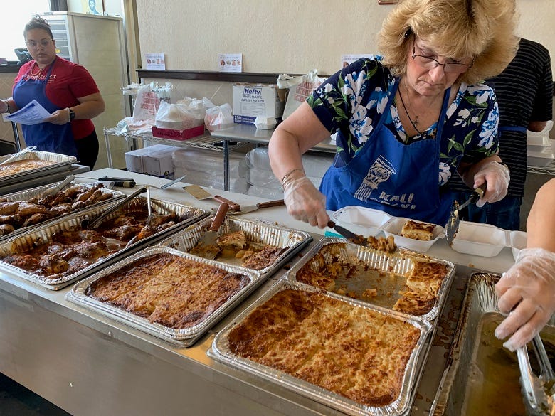 serving Greek food