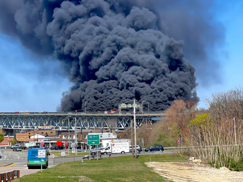 Black smoke rises from a crash involving an oil truck on the I-95 Gold Star Bridge in Groton, 4/21/23
