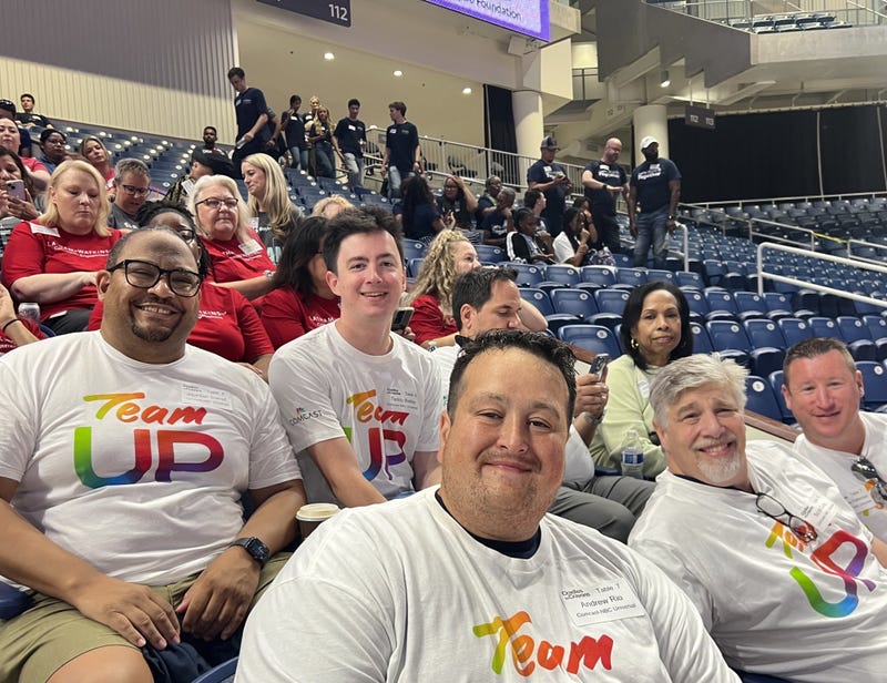Volunteers pose for a photo at the ninth annual Backpack-A-Thon, hosted by Cradles to Crayons Chicago. Organizers said more than 700 volunteers showed up to pack 35,000 backpacks with school supplies.