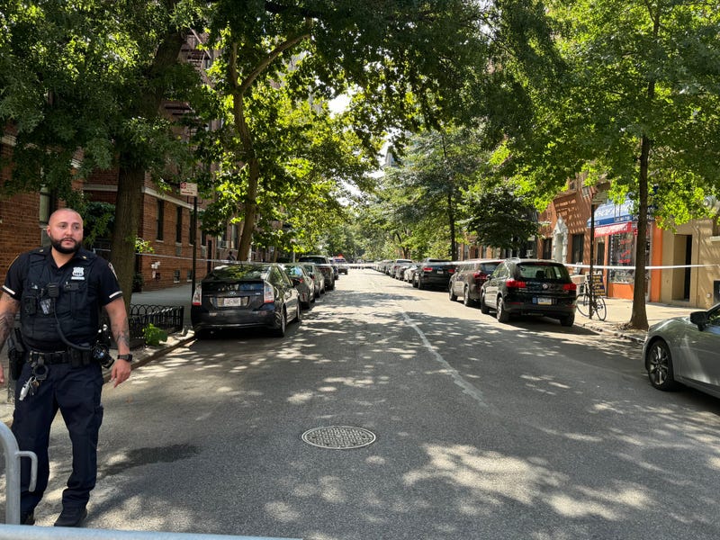 Police tape blocks off the shooting scene