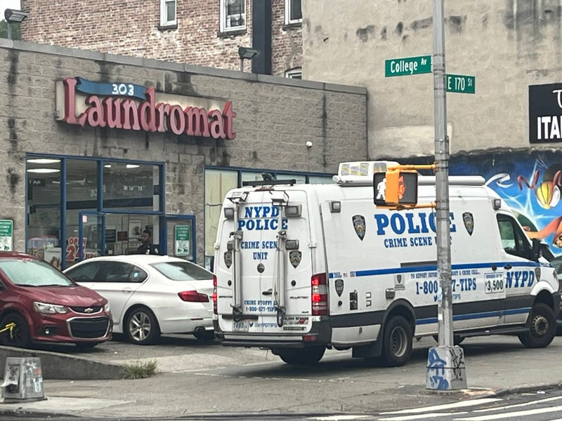 The NYPD continued to investigate at the 303 Laundromat on Thursday