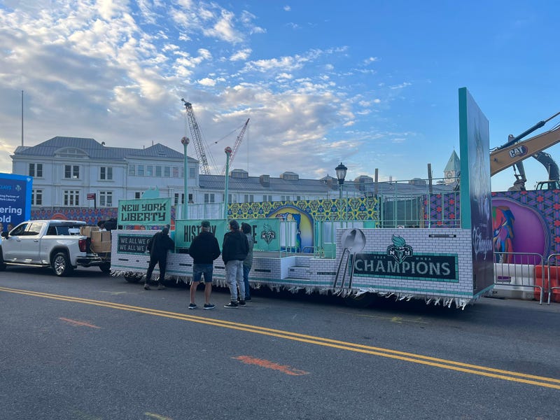 A float is prepared ahead of the parade