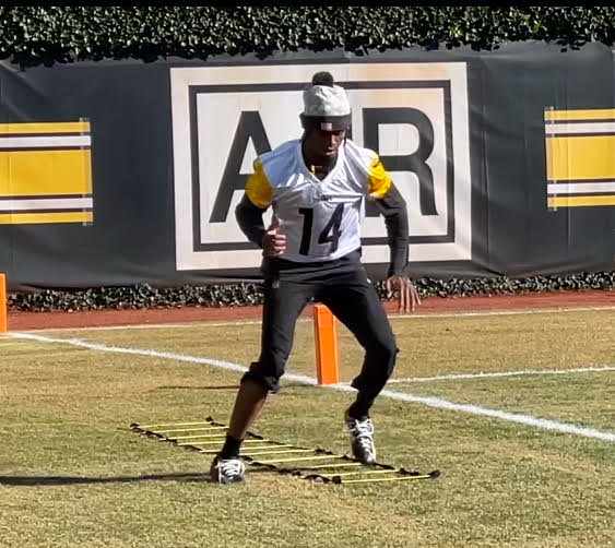 George Pickens working outside at practice